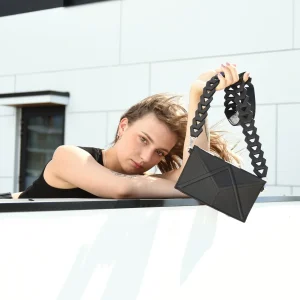 FACET Clutch-laukku Venetsia-hihnalla